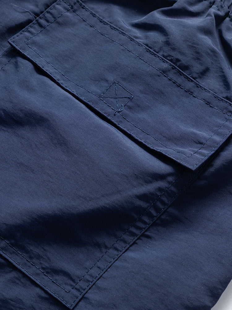 Set bestaande uit een overhemd met zeilprint geïnspireerd op de eilanden en bijpassende zwembroek.