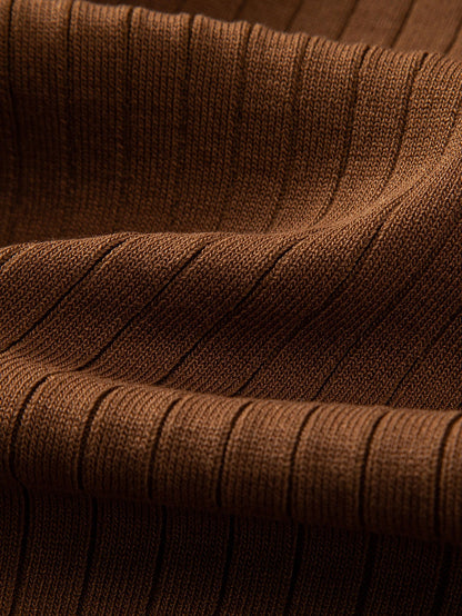 Gestreepte gebreide polo met V-hals