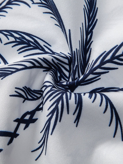 Overhemd met knoopsluiting en zeilprint, geïnspireerd op de eilanden, gecombineerd met een rechte, geribde broek.