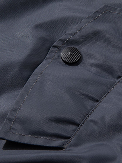 Omkeerbaar bomberjack met geborduurd NASA-embleem