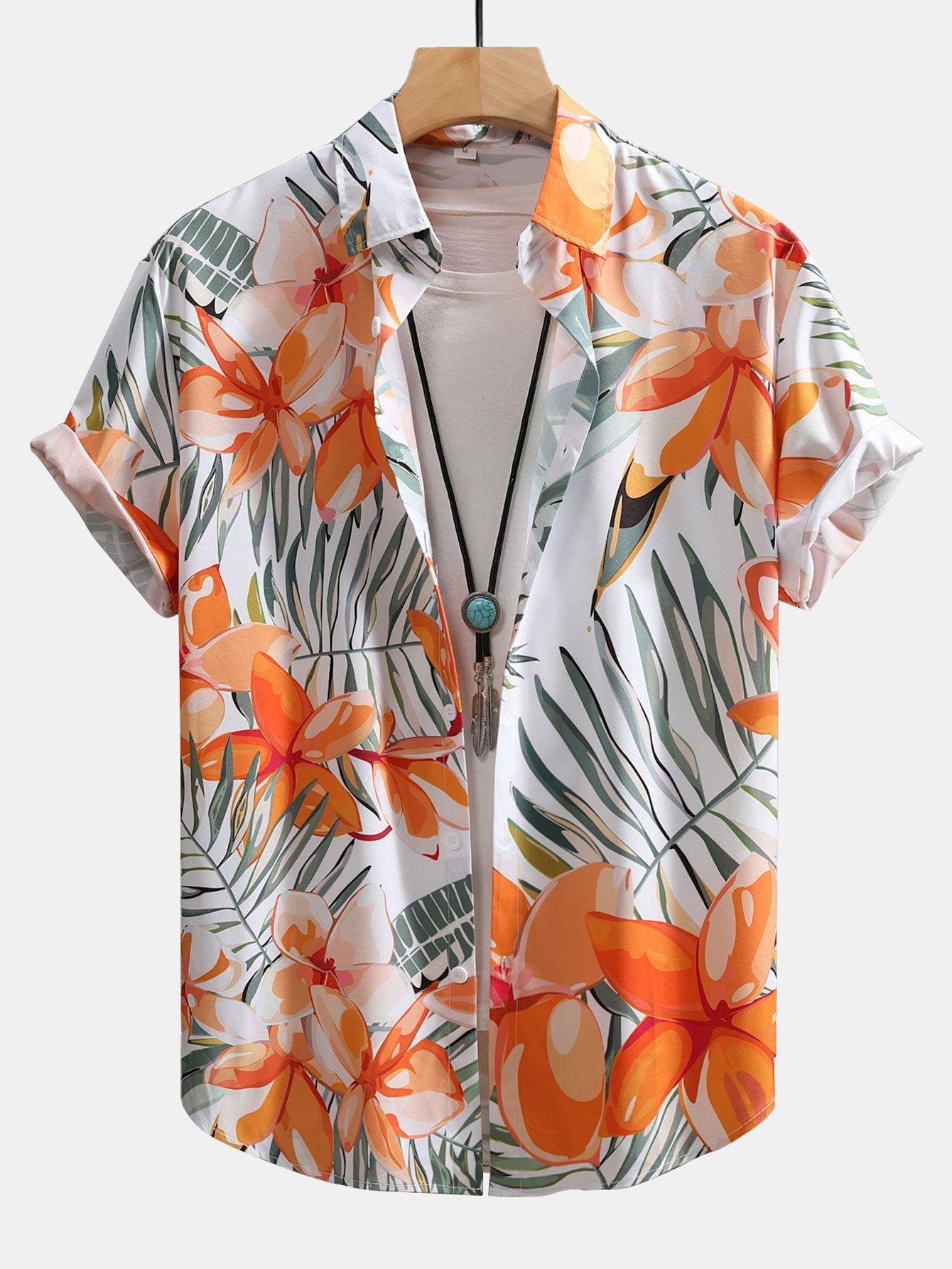 Blouse met bloemenprint en bijpassende zwembroek.